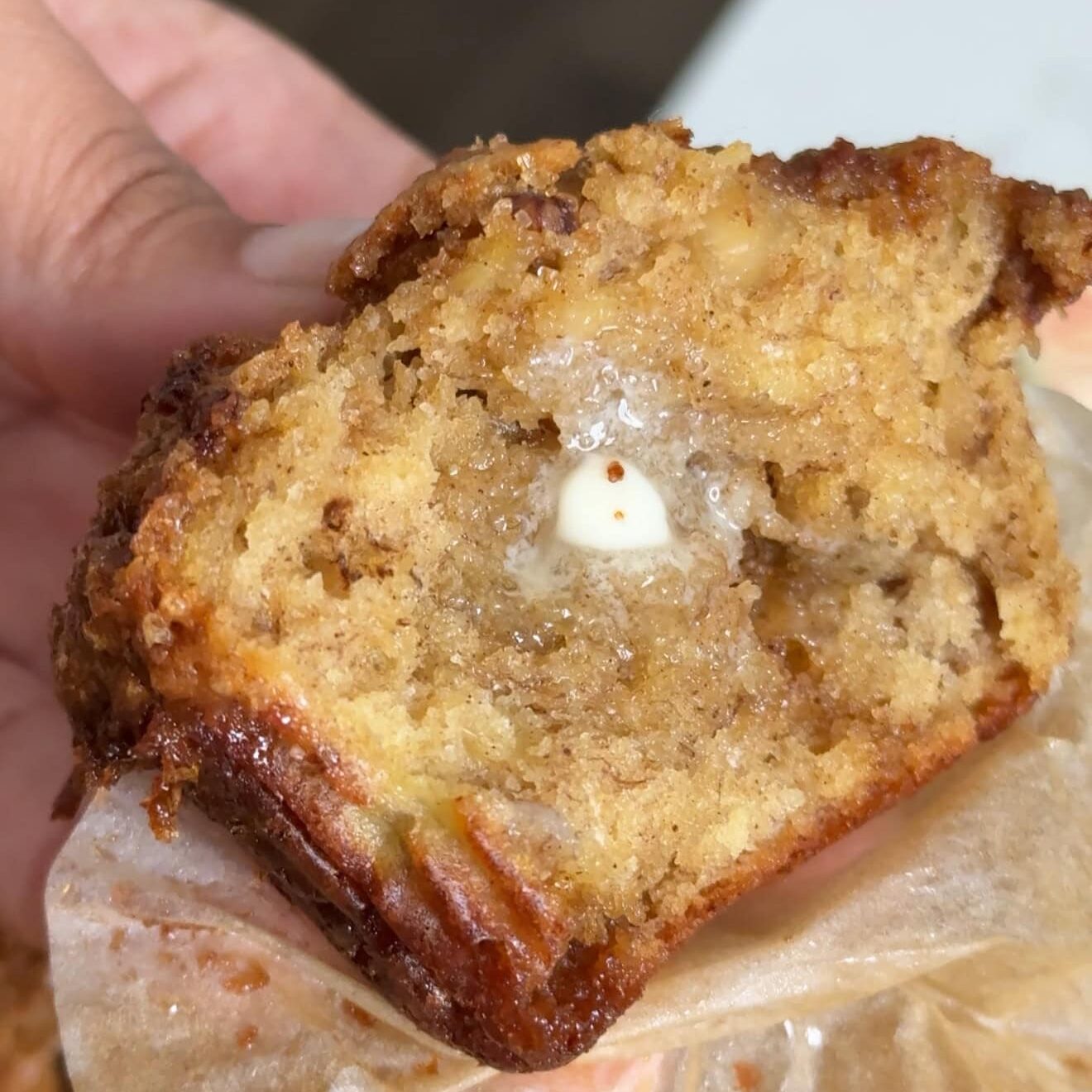 Tall brown butter banana nut muffins with crunchy sugar tops - Hungry Mockingbird