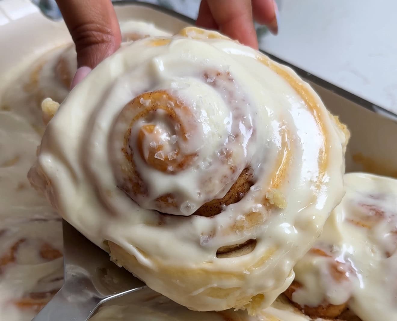 Soft mascarpone cinnamon rolls topped with salted vanilla cream cheese icing - Hungry Mockingbird
