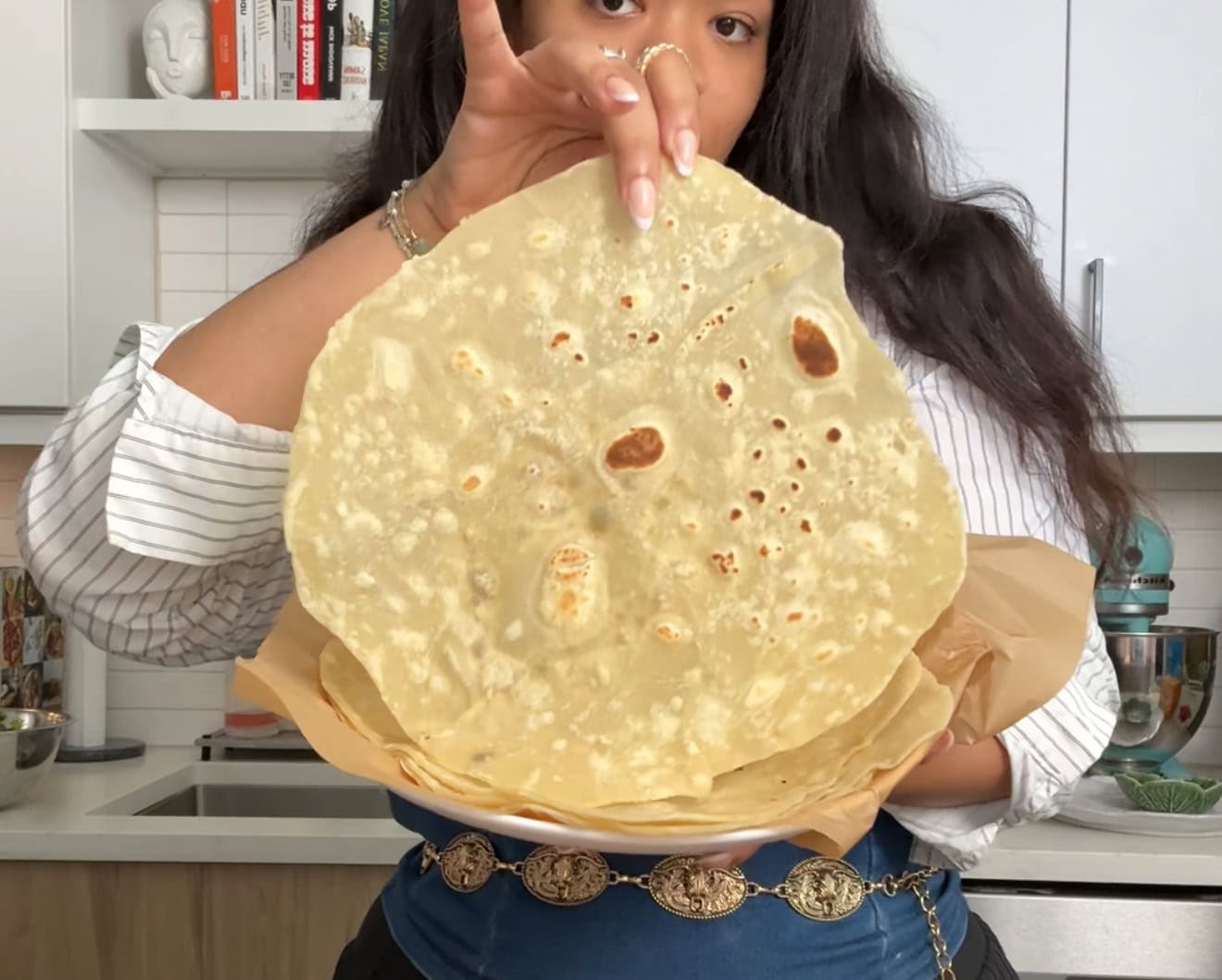 Stack of soft homemade flour burrito tortillas with golden brown spots - Hungry Mockingbird